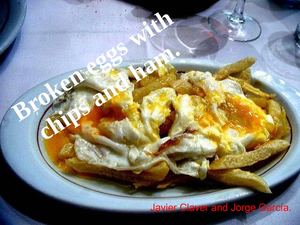 Broken eggs with ham and chips. 